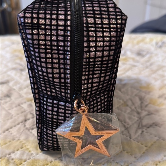 MAC Elegant Black and Gold Women's Cosmetic Bag
Soft Body - Picture 2 of 7